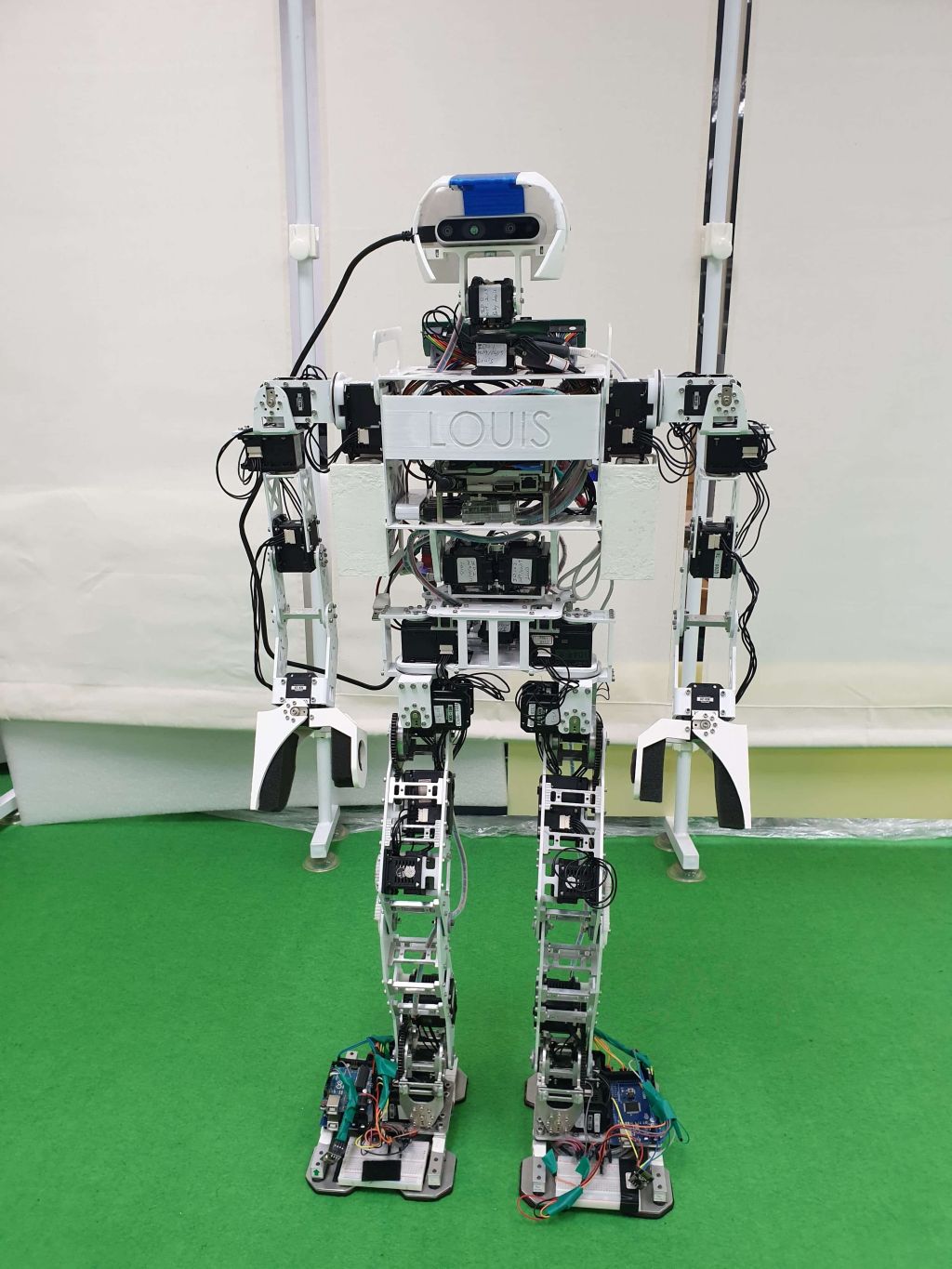Design and Implementation of Toddler-sized Humanoid Robot with Learning Capability